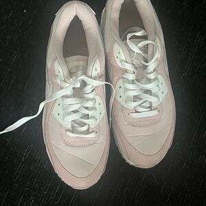 Nike Pink and White Sneakers with Classic Design